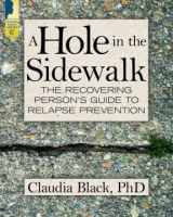 A_hole_in_the_sidewalk